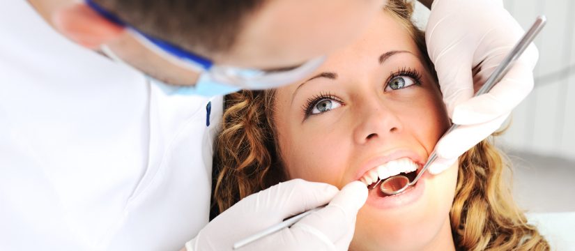 why choose a dental bridge over a dental implant